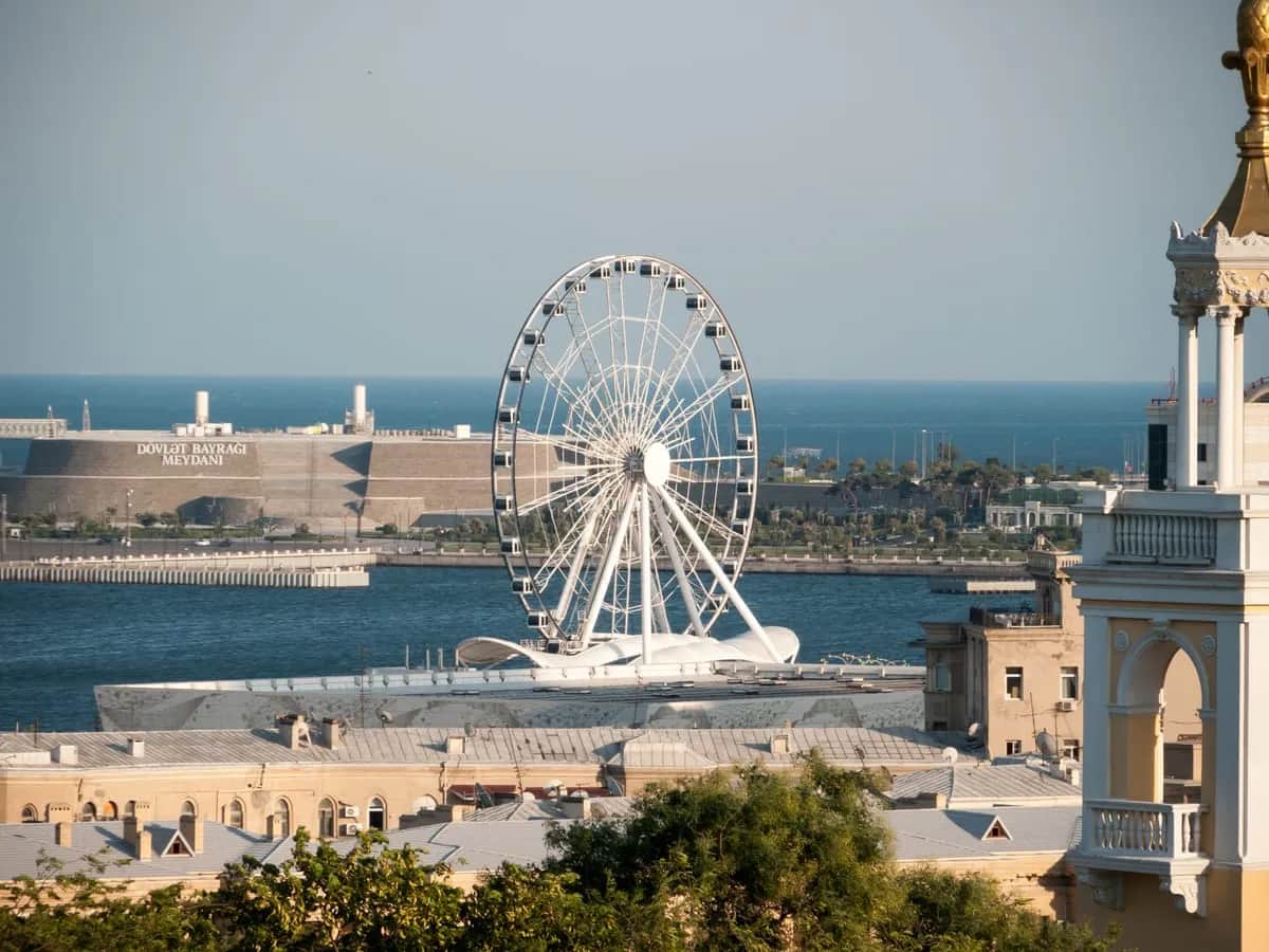 Baku Ferris Wheel and Caspian waterfront; destination reference for Azerbaijan touring programmes