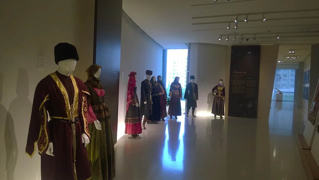 Mannequins displaying traditional Azerbaijani dress inside the Heydar Aliyev Center museum