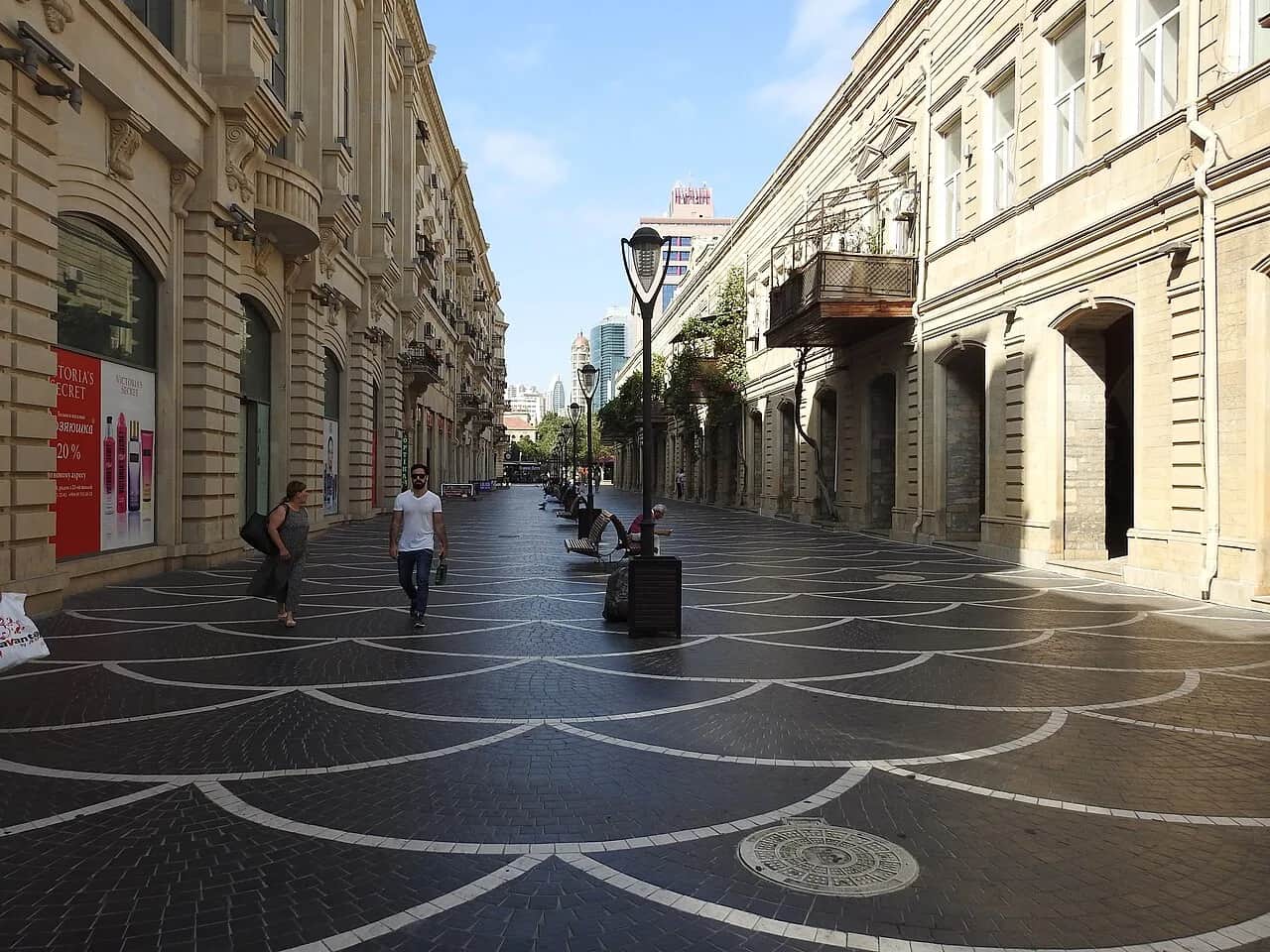 Travellers and residents walking along pedestrianised Nizami Street in central Baku
