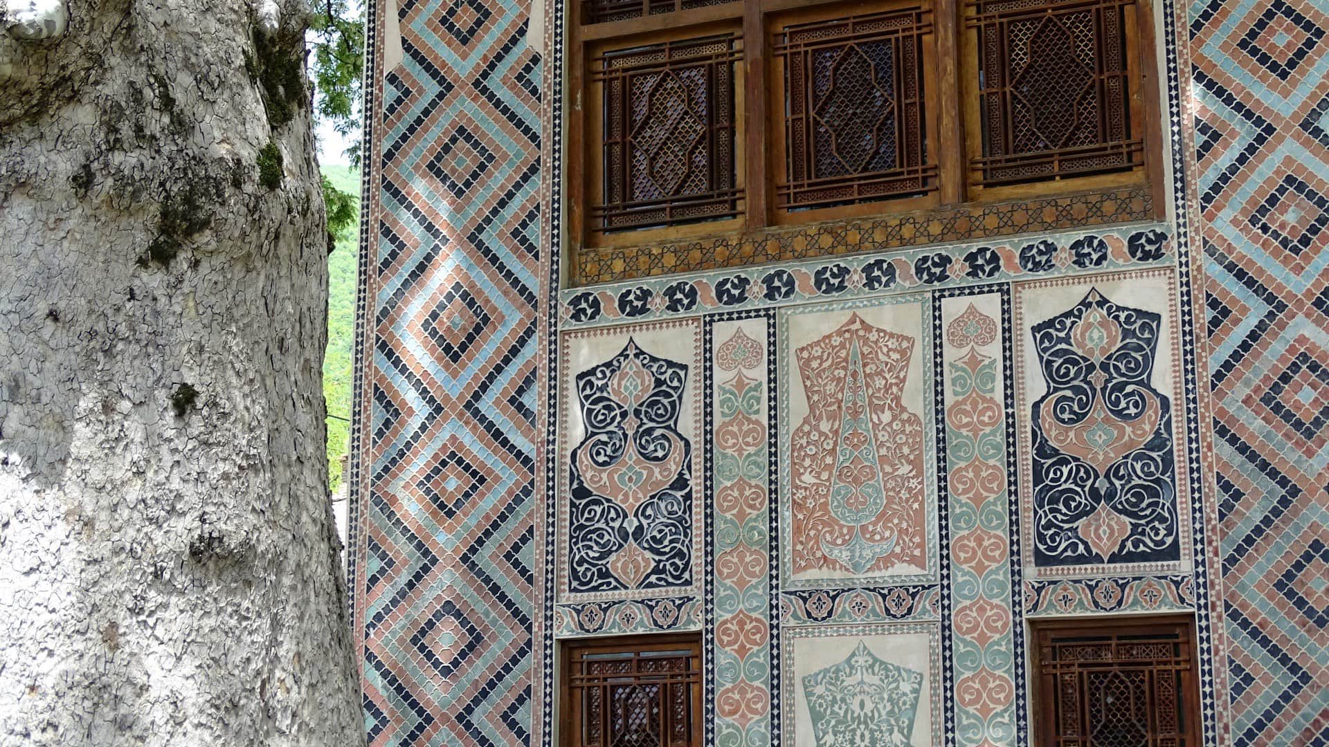 Sheki Khan's Palace facade detail with shebeke stained glass and painted ornament
