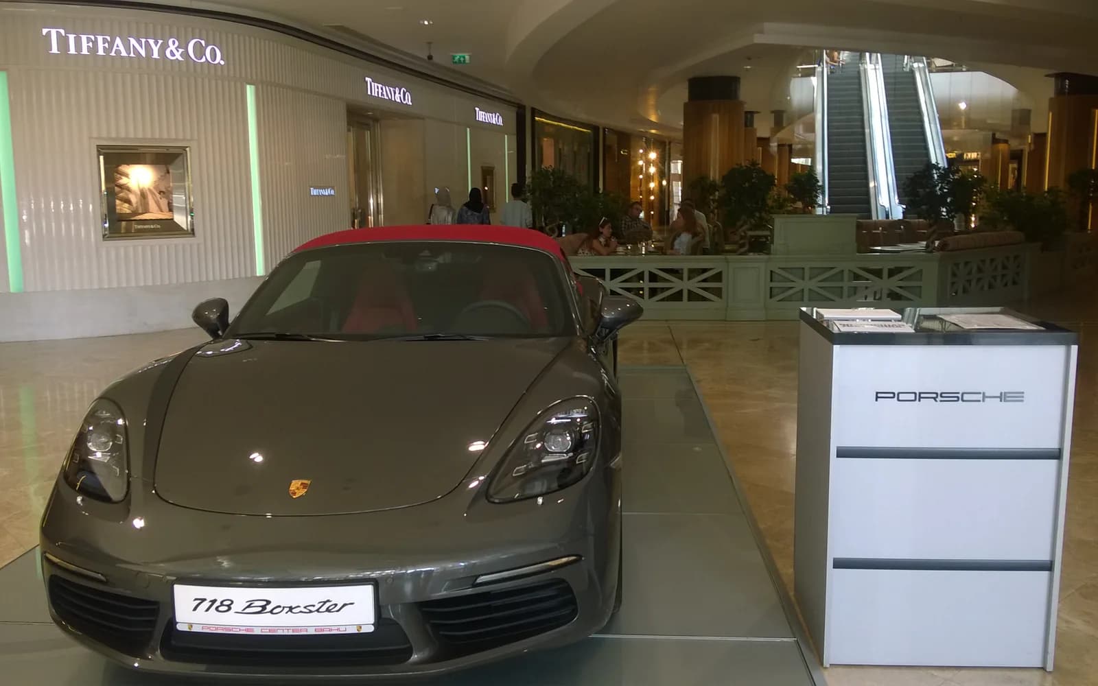 Porsche displayed at a luxury car exhibition in Baku