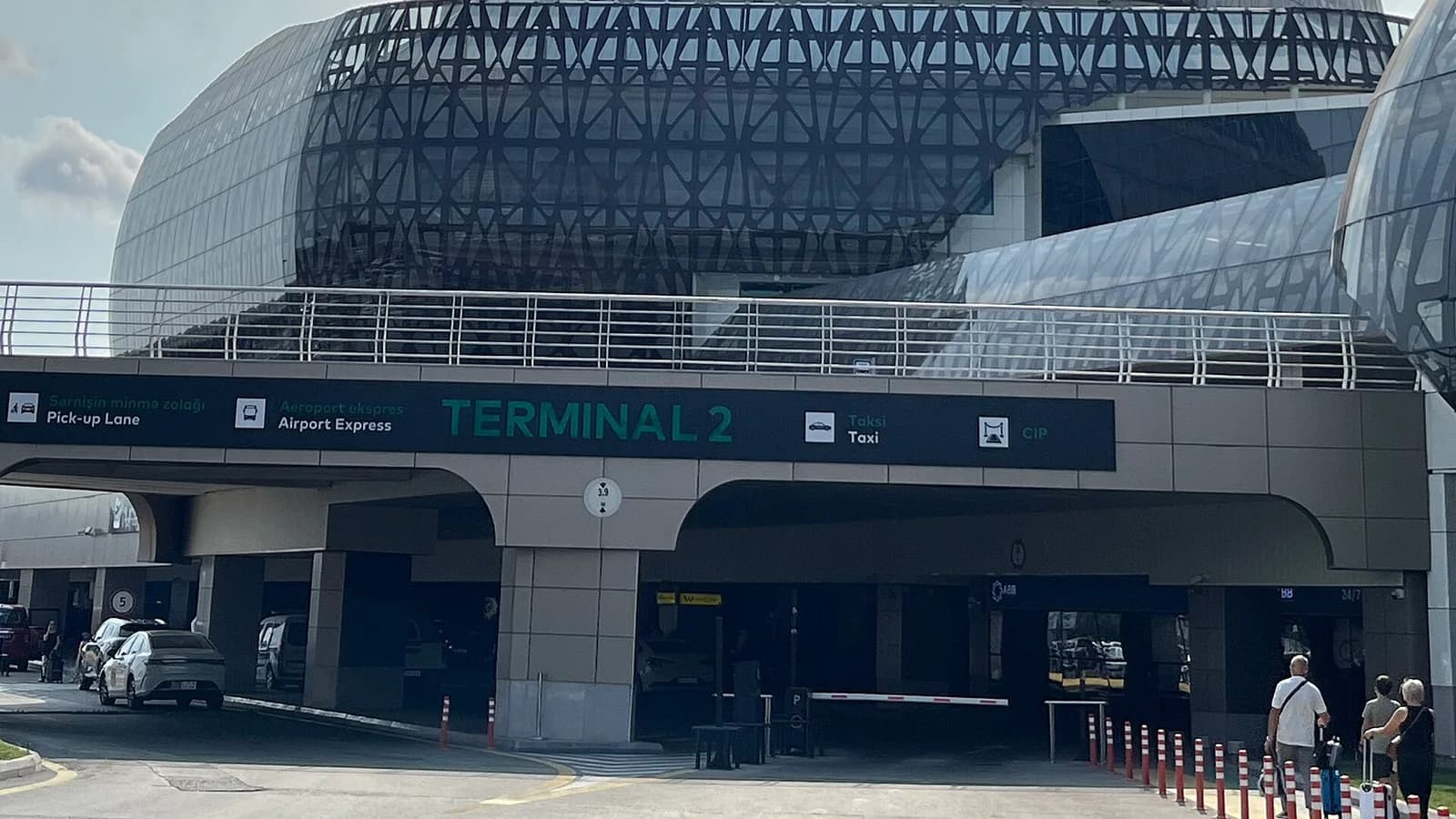 Terminal 2 exterior and arrival lanes at Heydar Aliyev International Airport in Baku