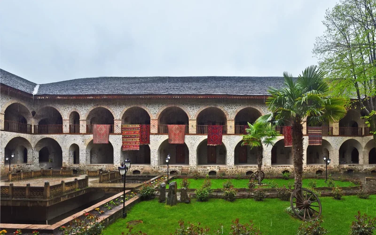 Garden courtyard of the Upper Caravanserai in Sheki, a common overnight on longer Azerbaijan itineraries