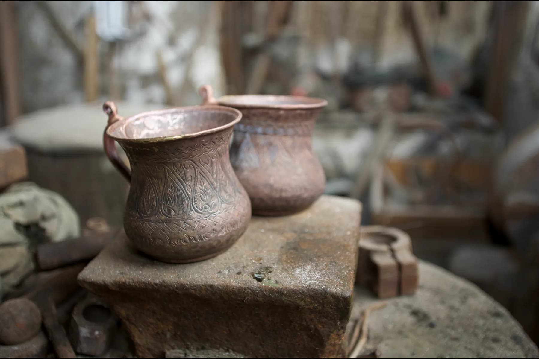 Engraved copper vessels in a Lahij coppersmith workshop in Azerbaijan