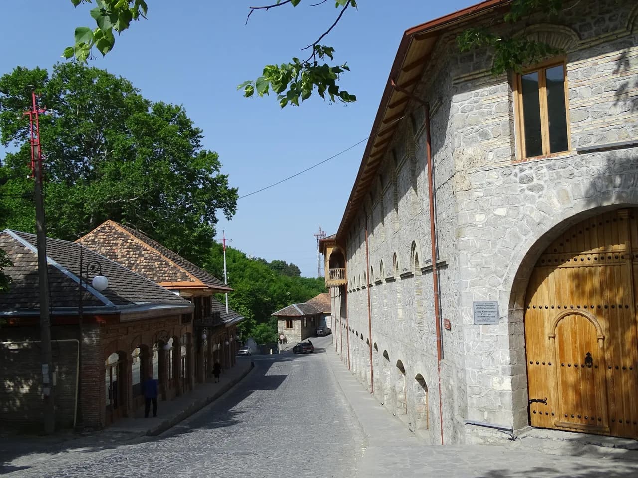 A cobbled street and stone buildings in Sheki, Azerbaijan