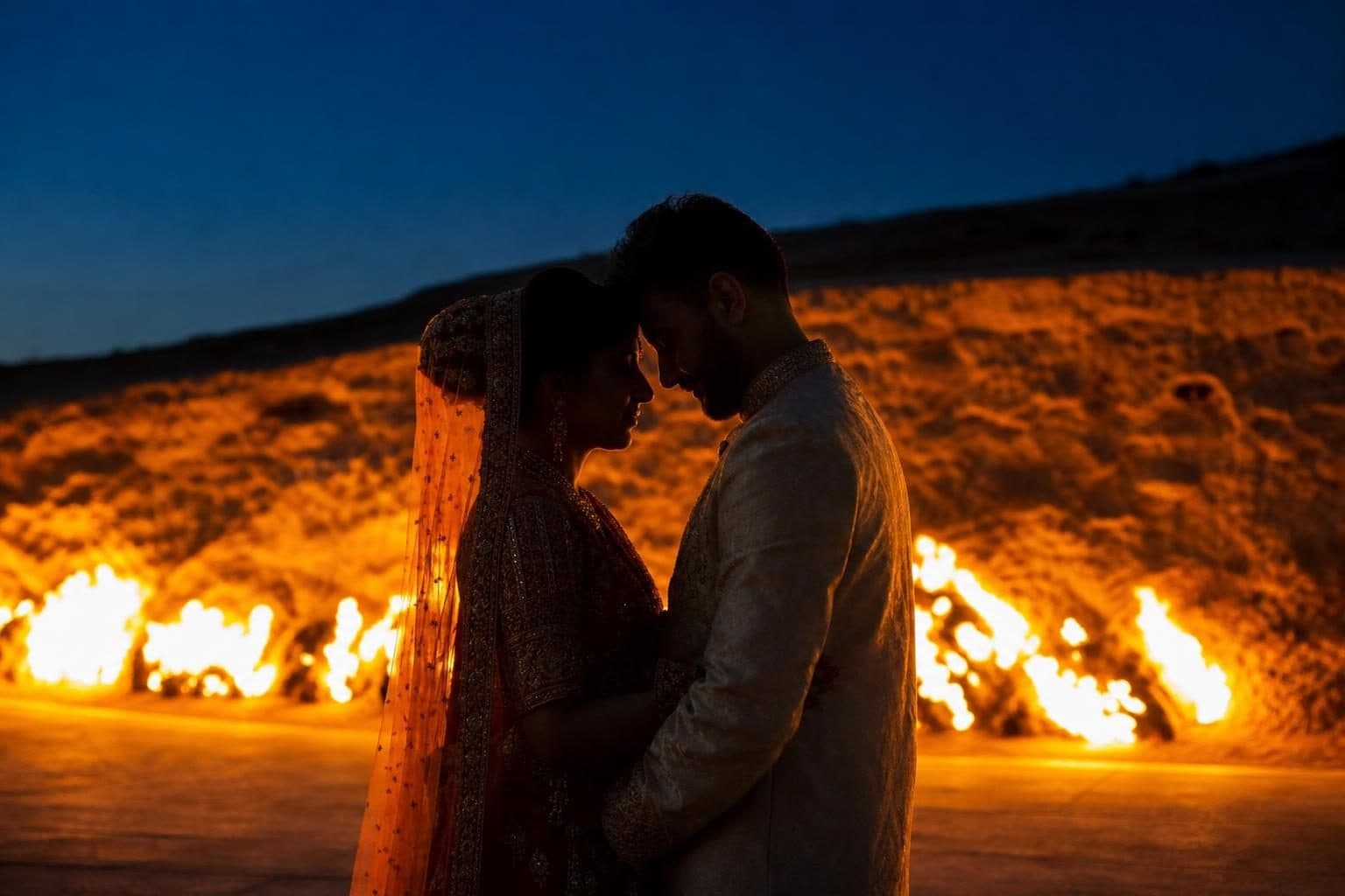 Indian couple photographed side-back angle, Yanardag, Baku