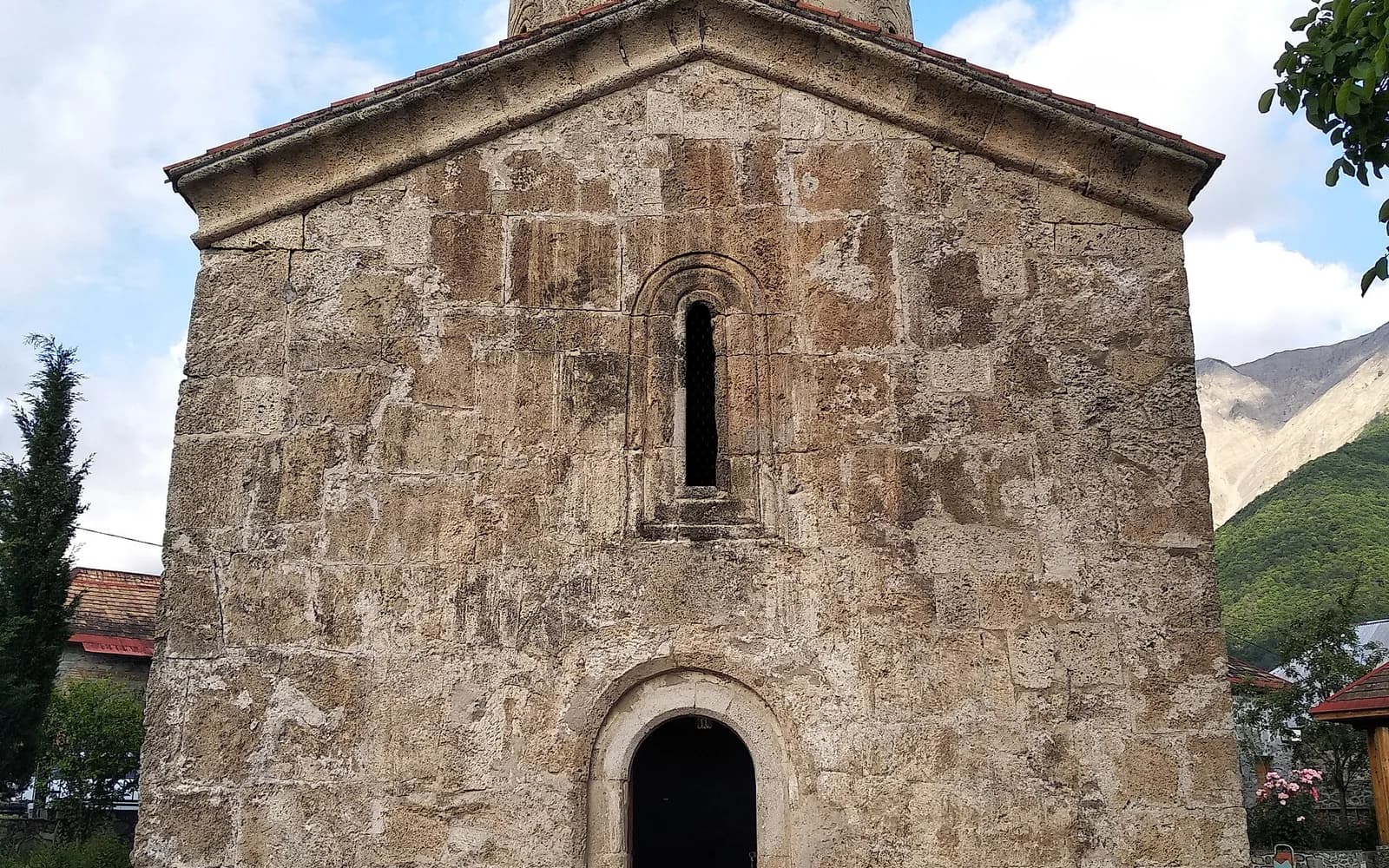 Church of Kish exterior seen from its garden