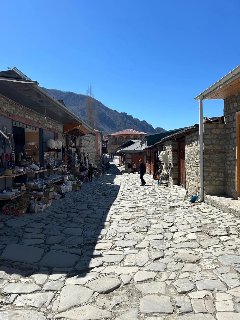 Uneven stone paving on a street in Lahij