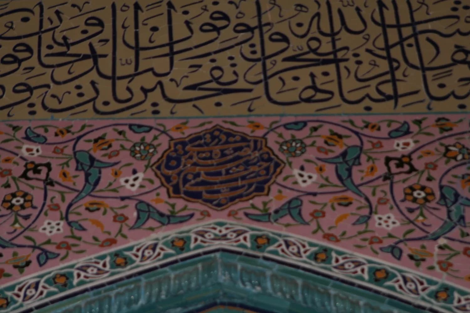 Calligraphy and floral tilework inside the Friday Mosque in Shamakhi