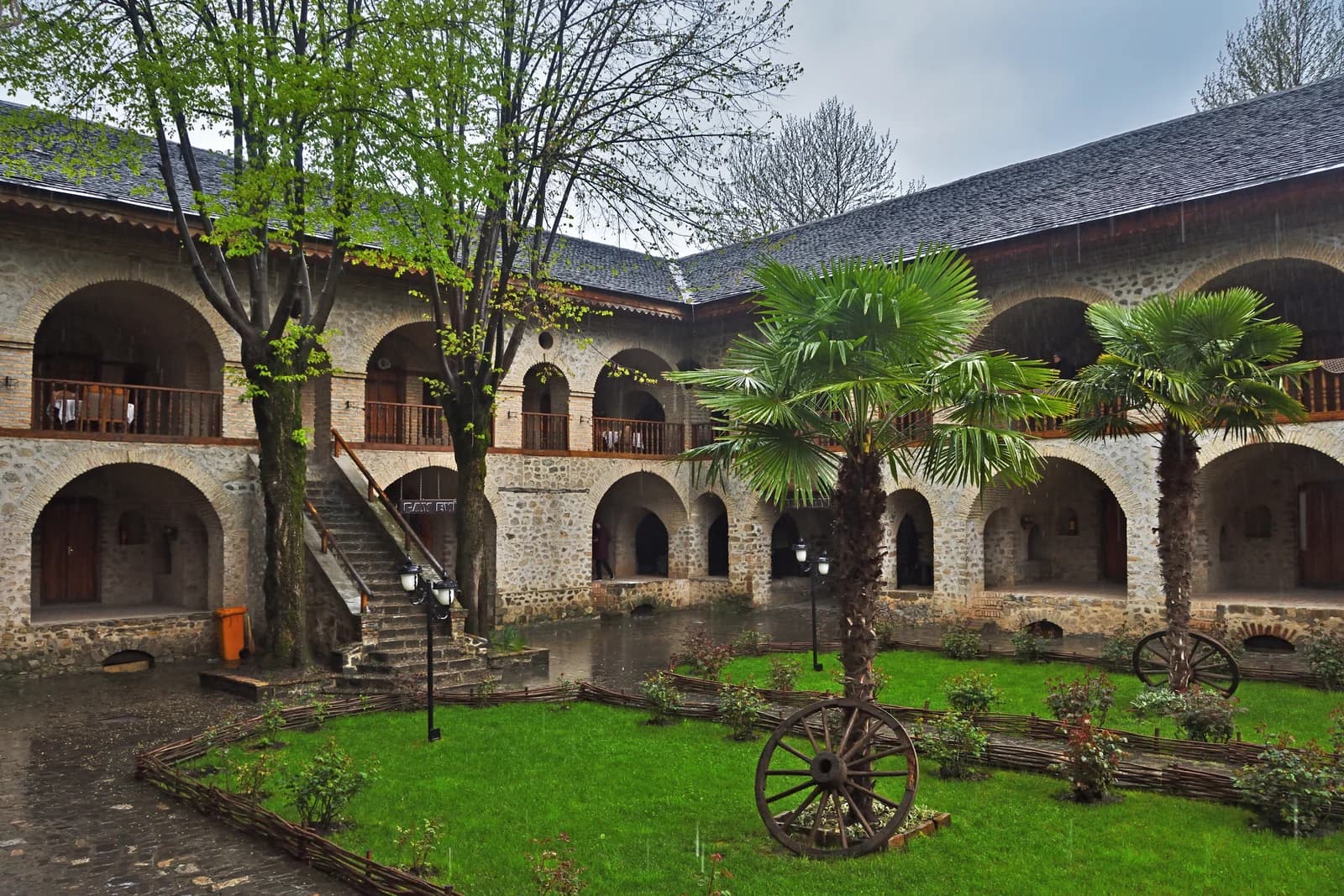The garden courtyard of the Upper Caravanserai in Sheki