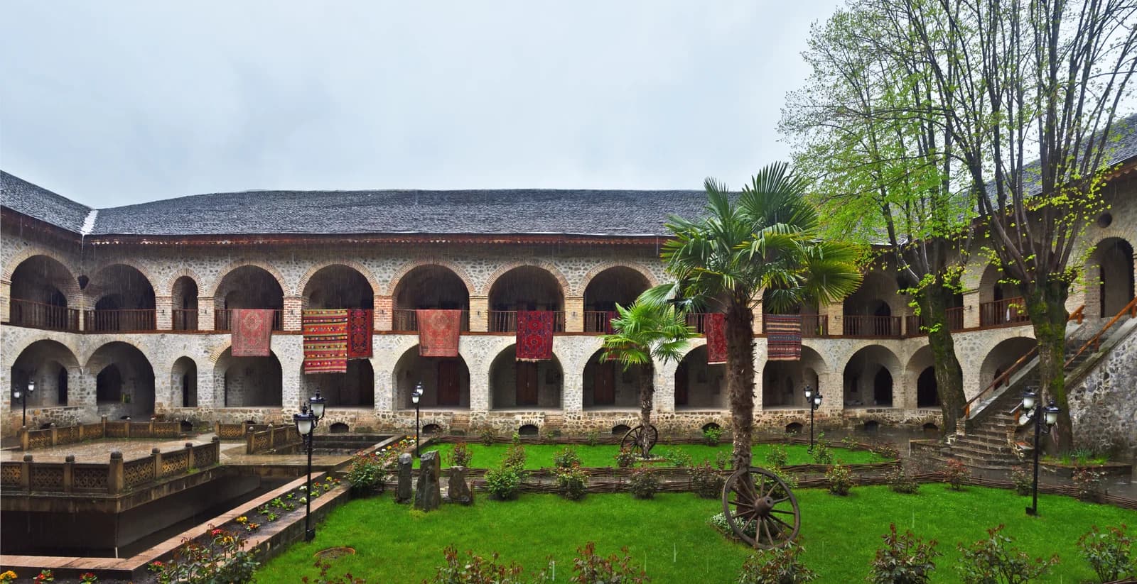 The garden courtyard of the Upper Caravanserai in Sheki