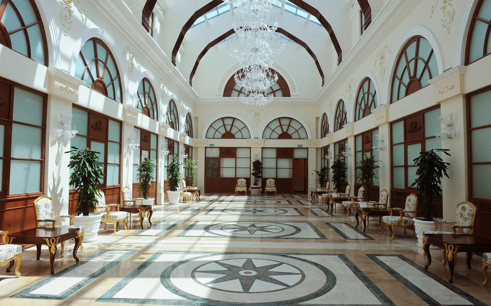 Chandelier-lit interior hall at the Palace of Happiness in Baku