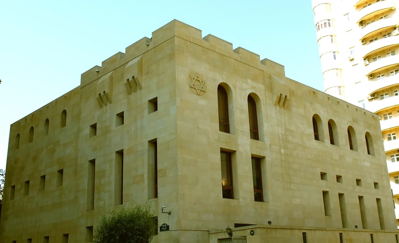 The Ashkenazi and Georgian synagogue in Baku, a stone building with a Star of David above the entrance front