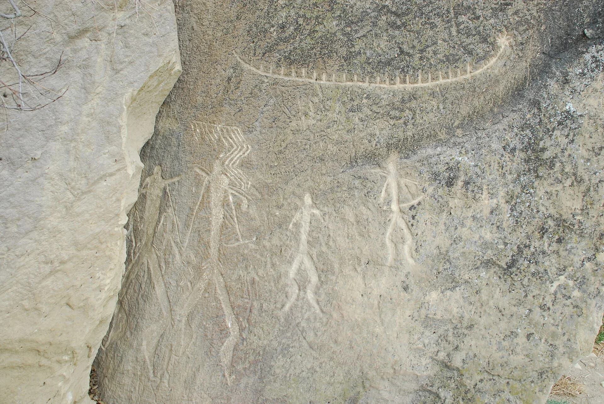 Ancient rock carvings on a stone surface in Gobustan State Reserve