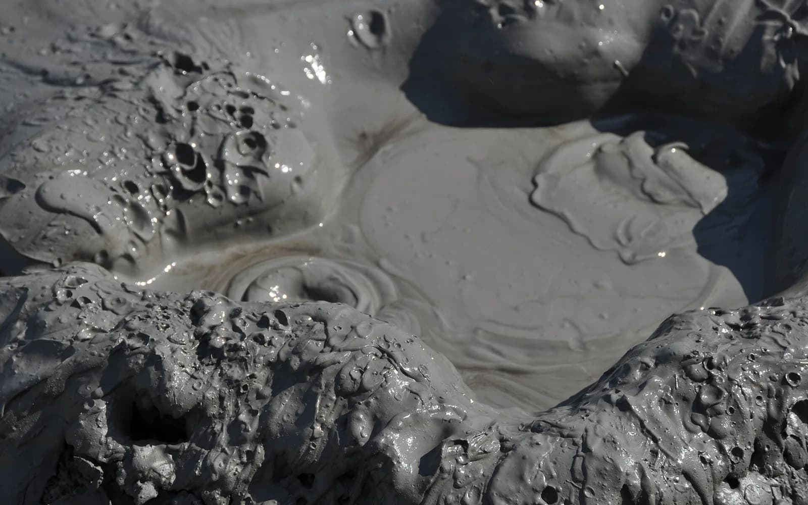Close view of a bubbling Gobustan mud volcano
