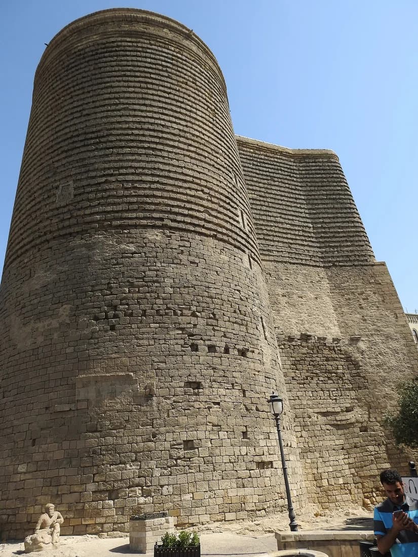 Curved stone walls of Maiden Tower in Baku