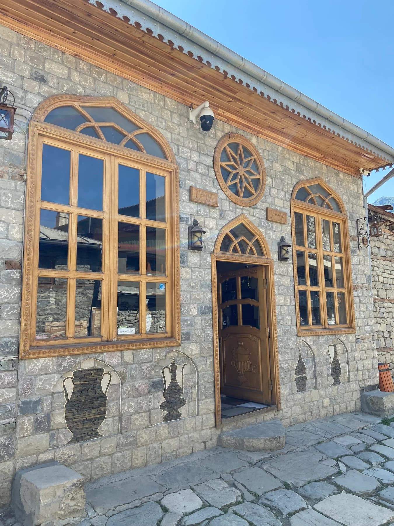 Traditional stone architecture and wooden balconies in Lahij