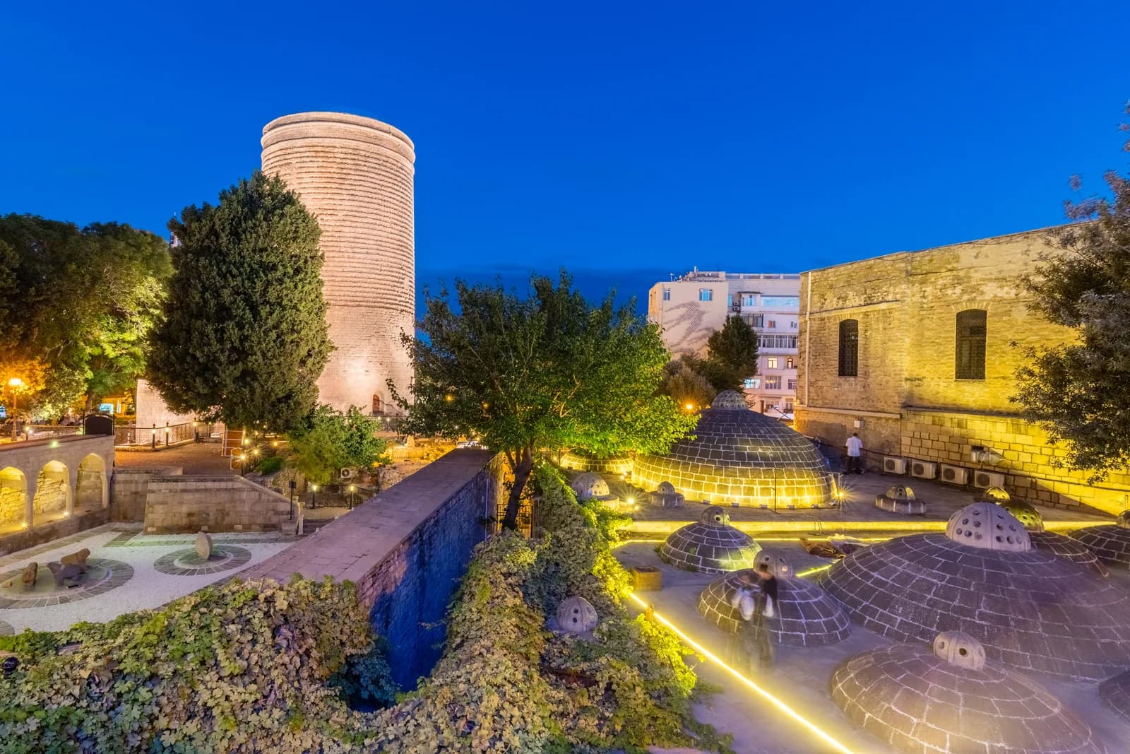 Maiden Tower and nearby Old City roofs at blue hour