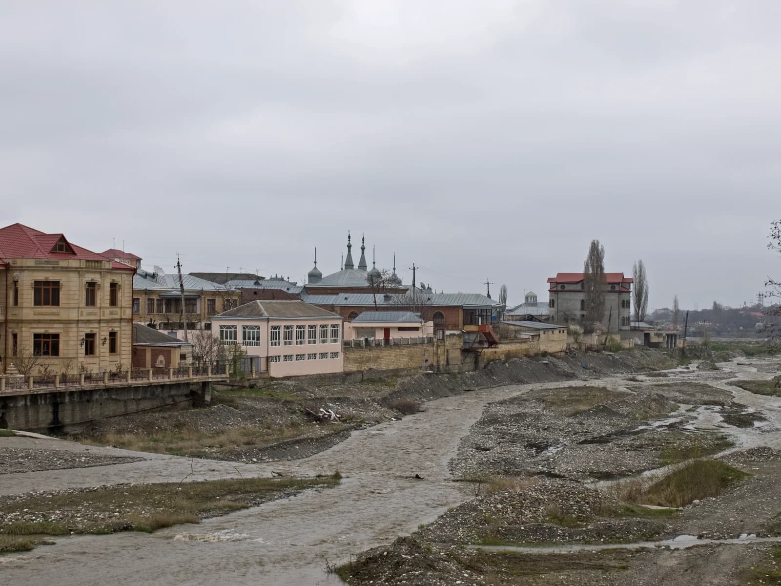 Red Village viewed across the river near Quba